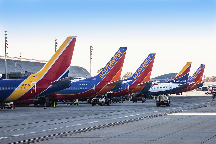 Southwest Tall Tails at Orange County Airport Photograph by Erik Simonsen
