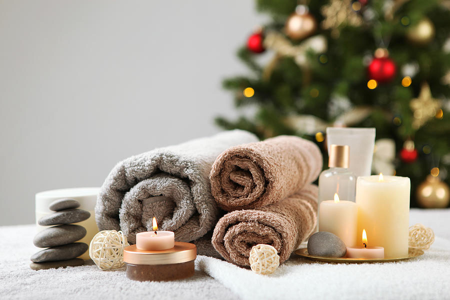spa composition on the table and Christmas accessories. Relaxation care products. Skin care Photograph by White Bear Studio
