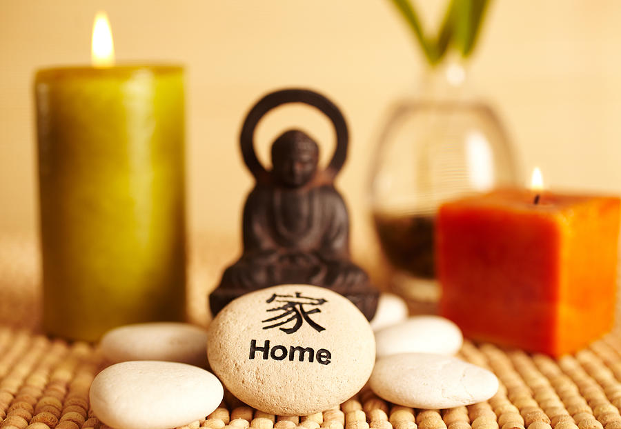 Spa still life buddha statue and candles, home pebble Photograph by GSPictures