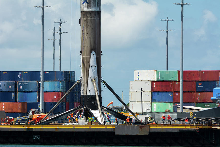 SpaceX booster and ground crew at dock Photograph by Bradford Martin