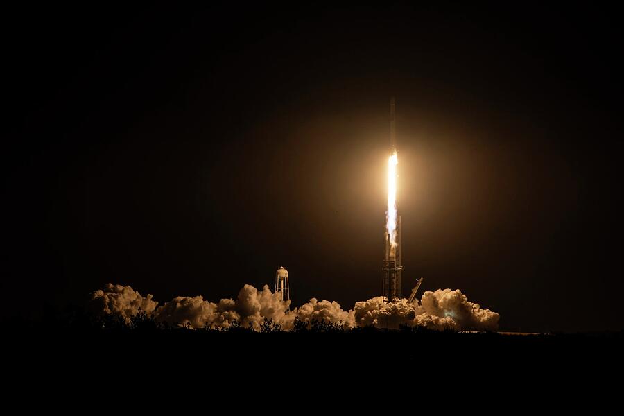Space Photograph - SpaceX Falcon 9 rocket launch at night by Realistic Space