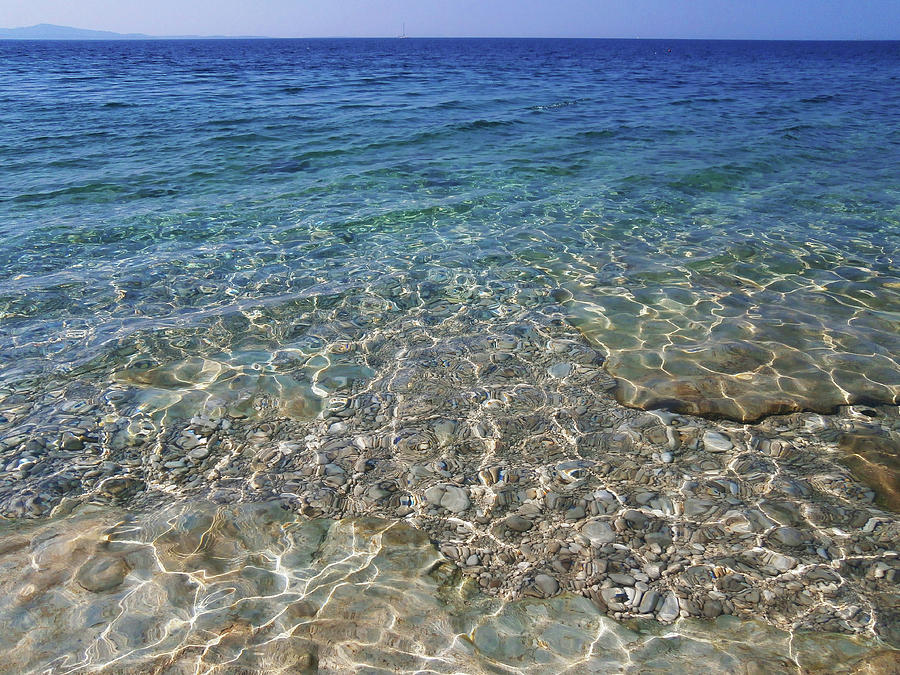 Clear Blue Adriatic Sea with Bright Sun Sparkles and Transparent Water Photograph by Aneta Soukalova