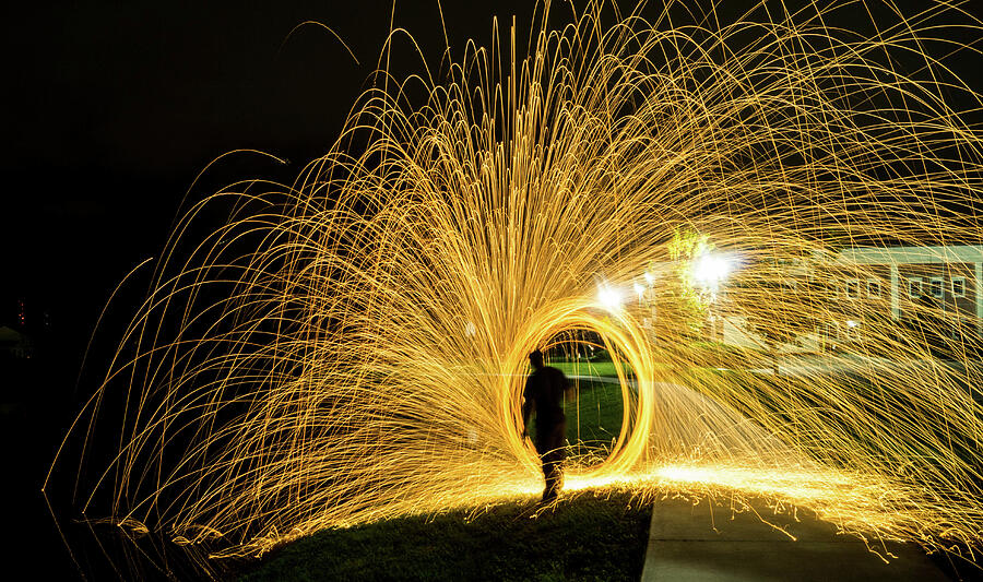 Sparks by the Lake Photograph by Chauncy Holmes