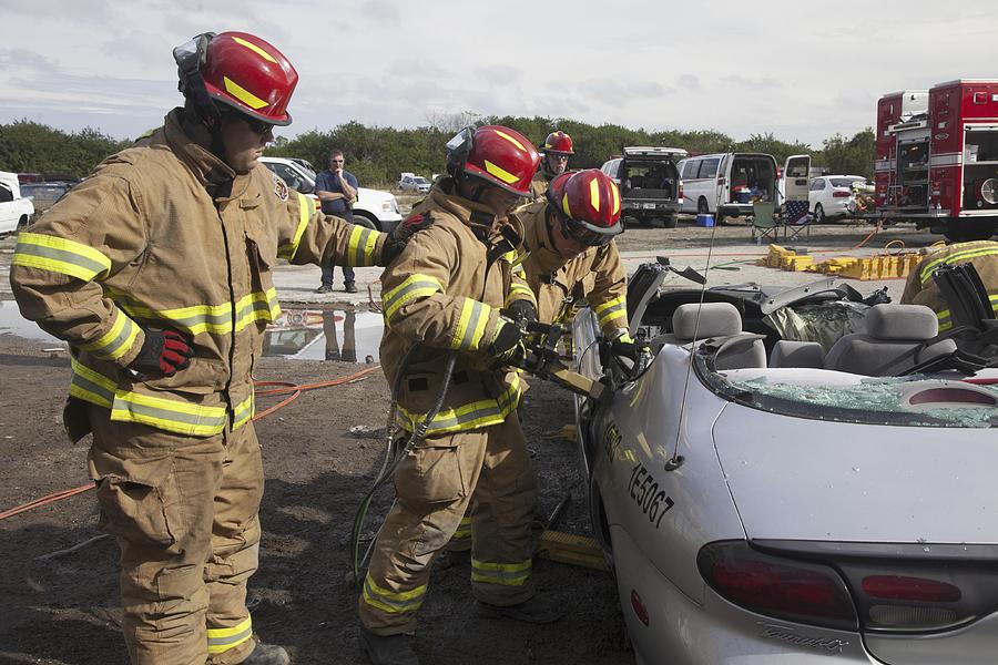 Car Painting - Special Rescue Operations firefighters with NASA Fire Rescue Services at NASAs Kennedy Space Center  by Les Classics