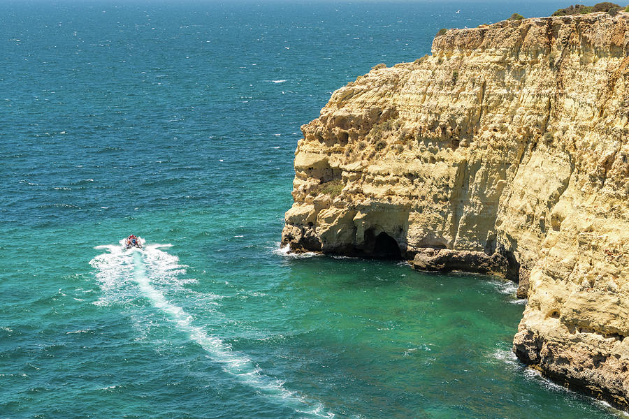 Speeding Motorboat - Blue Coastal Trip at Carvoeiro Algarve Portugal Photograph by Georgia Mizuleva