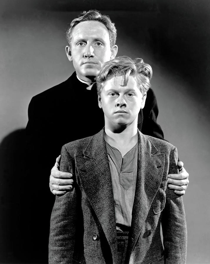 SPENCER TRACY and MICKEY ROONEY in BOYS TOWN -1938-, directed by NORMAN TAUROG. Photograph by Album