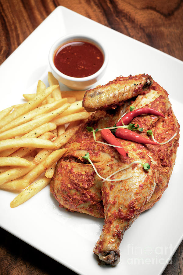 Spicy Portuguese Piri Piri Half Chicken With Fries On Plate Photograph