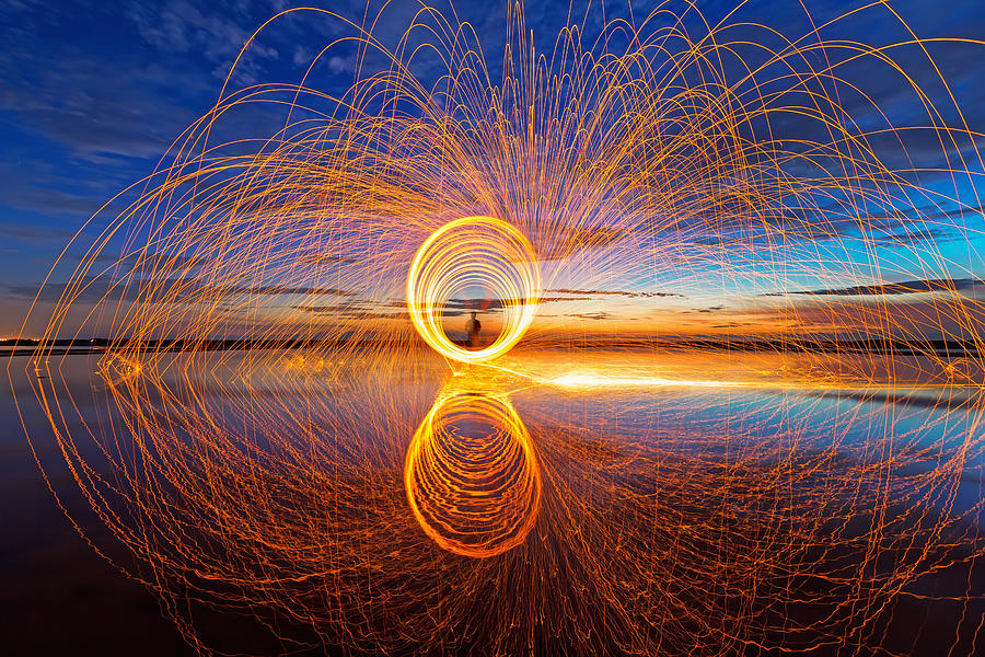 Spinning reverse Photograph by Monthon Wa