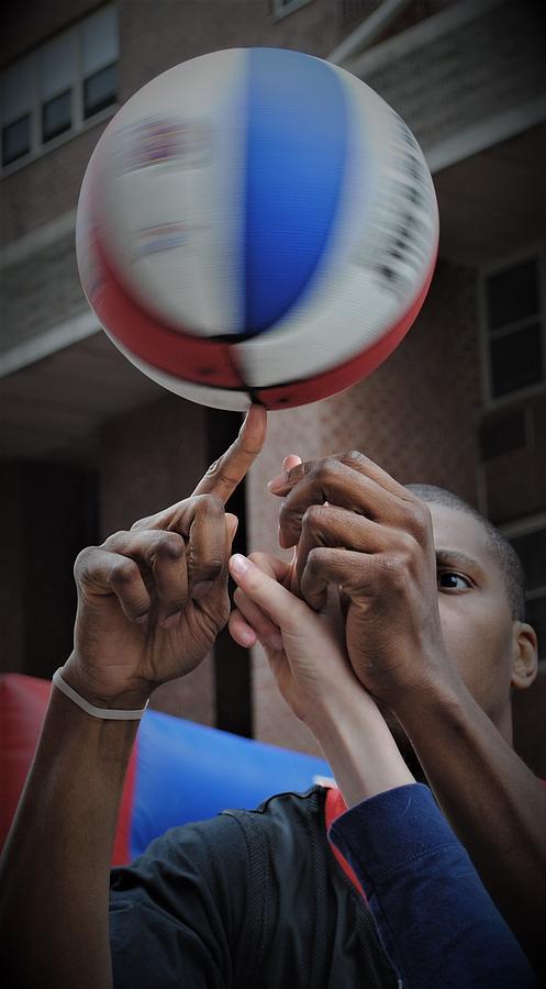Basketball Photograph - Spinning the Ball together in NYC by Elizabeth Pennington