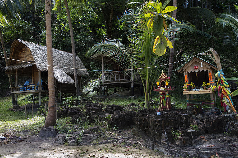 Spirit houses and wooden huts on Koh Wai island Photograph by Igor Bilic