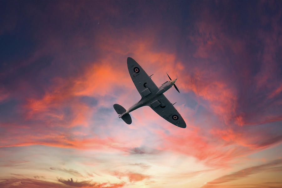 Spitfire flying at sunset Photograph by Andrew Lalchan