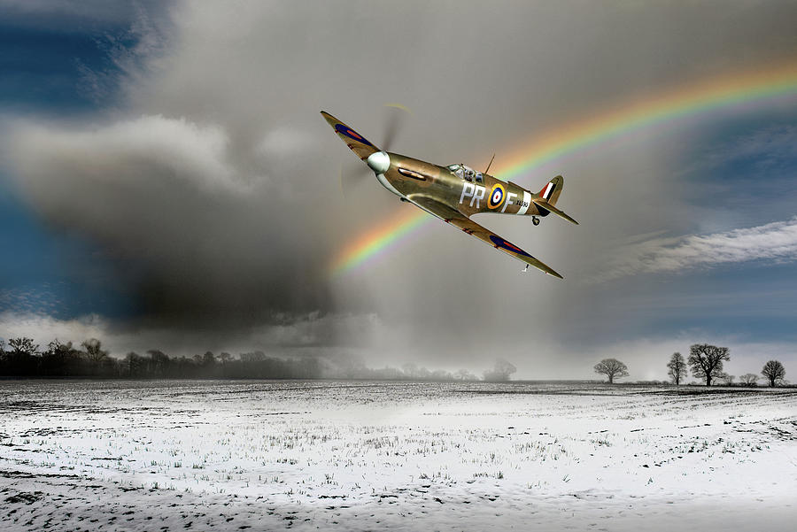 Spitfire with snow shower rainbow Photograph by Gary Eason
