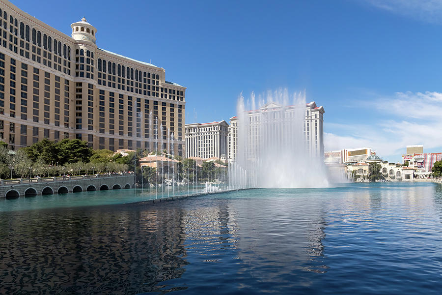 Splendiferous Las Vegas Fountains - Caesars Palace Tower Behind a Curtain of Water Photograph by Georgia Mizuleva