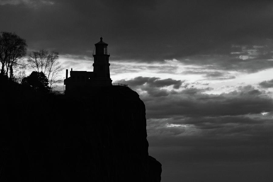Lighthouse Photograph - Split Rock Lighthouse in Minnesota located along Lake Superior in black and white by Eldon McGraw