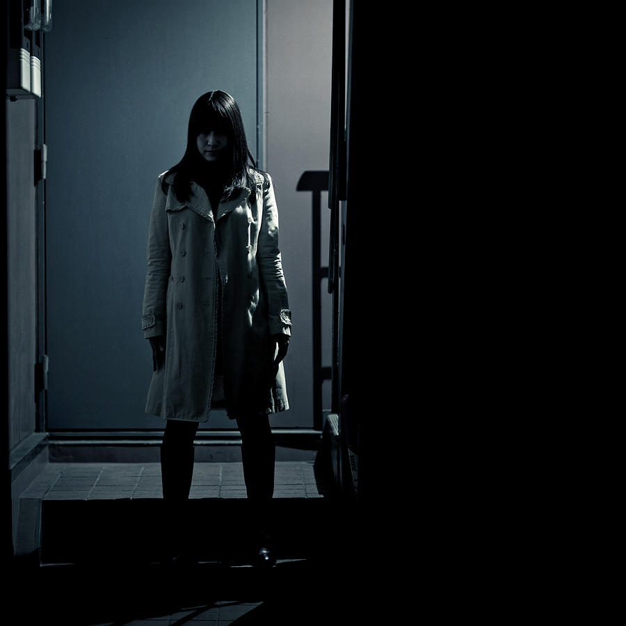 Spooky Japanese Girl At The Entrance Of Building Photograph by Thepalmer