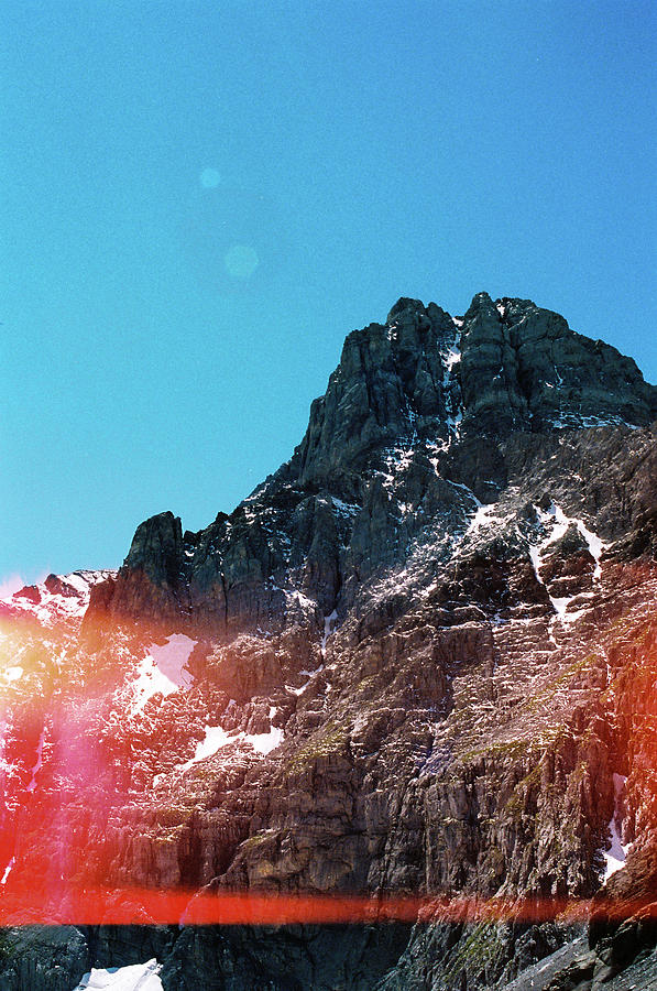 Spotlight on the summit Photograph by Barthelemy de Mazenod