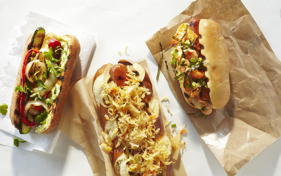 Spread of Three Types of Hot Dogs Photograph by Annabelle Breakey