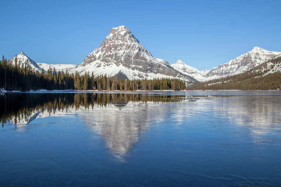 Spring at Two Medicine Lake Photograph by Jack Bell