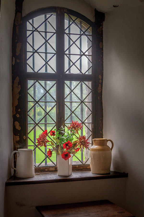 Spring Flowers in a Medieval Window Photograph by W Chris Fooshee