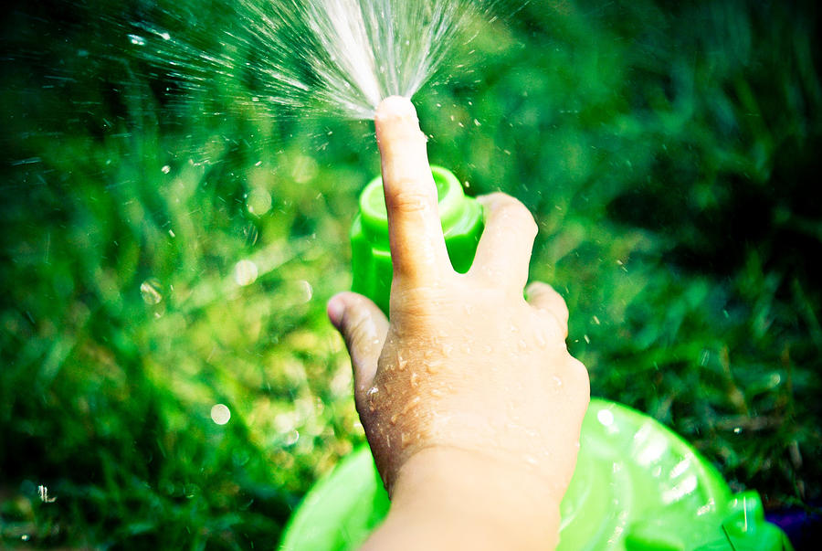 Sprinkler play Photograph by photo by Kristin Zecchinelli