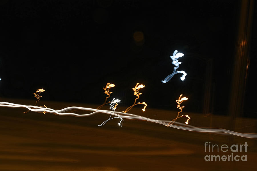 Sprites on the Move Photograph by Kae Cheatham