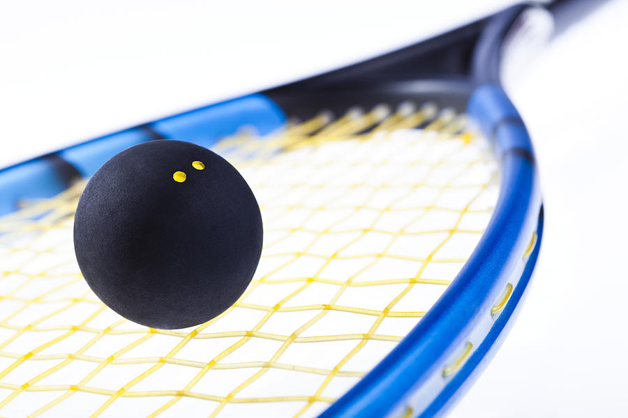 Squash racquetball and racket Photograph by Mbbirdy