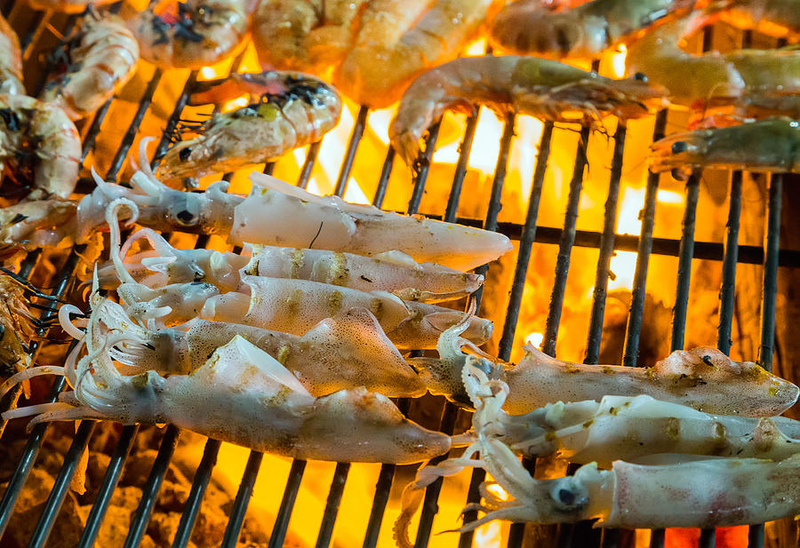 squid Barbecue Grill cooking seafood. Photograph by VladyslavDanilin