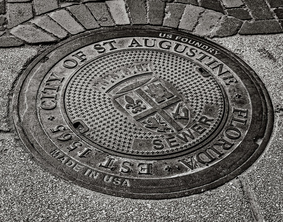 St. Augustine manhole cover Photograph by Andy Crawford
