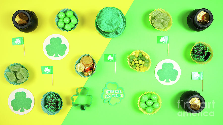 St Patricks Day flat lay with chocolate coins, leprechaun hat and shamrocks. Photograph by Milleflore Images