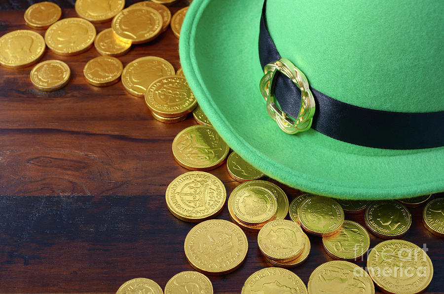 St Patricks Day hat and gold coins.  Photograph by Milleflore Images