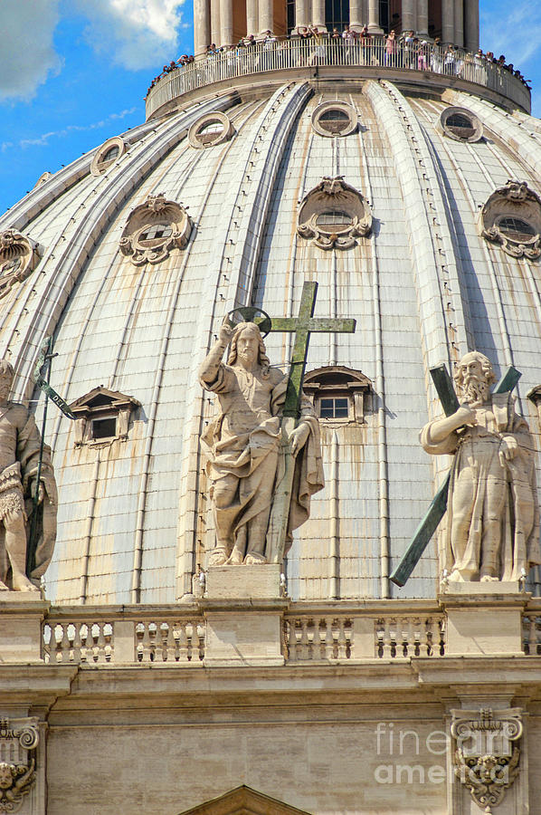 St. Peters Basilica Cathedrals dome with close-up of statue of Jesus Christ Photograph by Gunther Allen