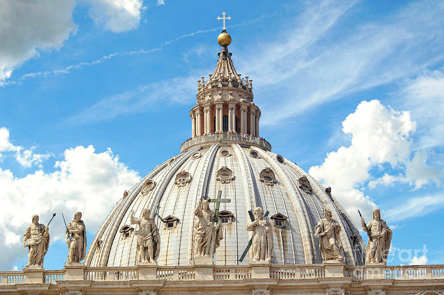 St. Peters Basilica Cathedrals roof with famous statues. Photograph by Gunther Allen