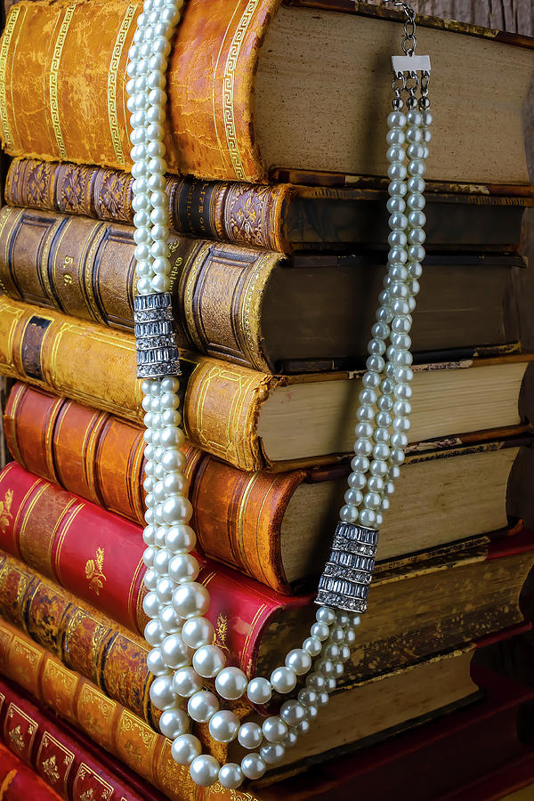 Stack Of Books With Pearls Photograph by Garry Gay