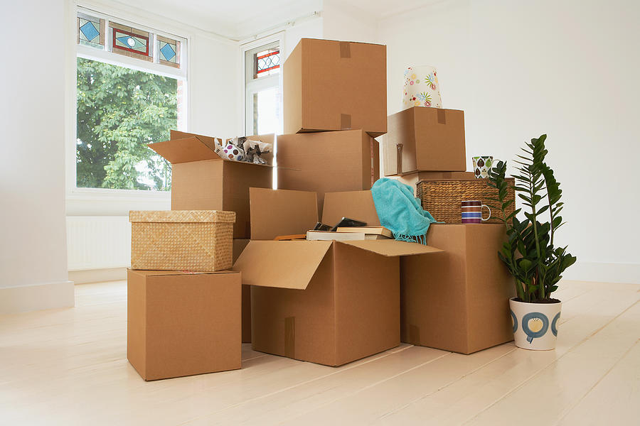 Stack of Boxes in New House Photograph by Moodboard