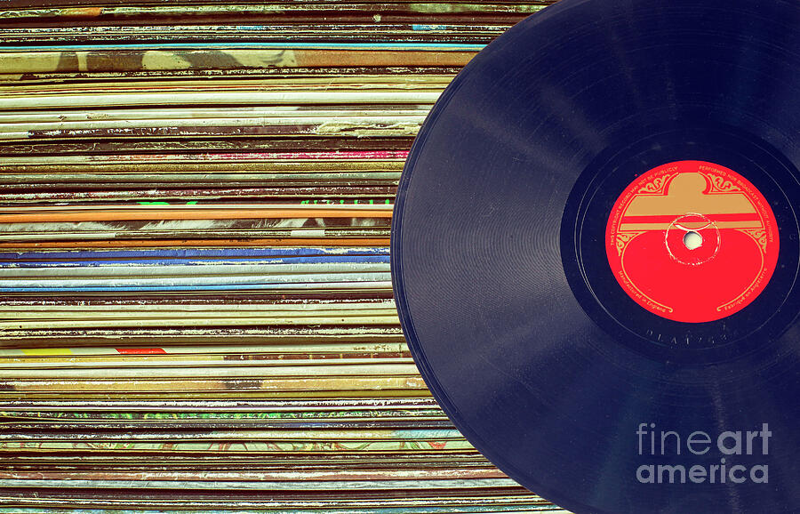 Music Photograph - Stack of classic album covers and vintage album by Patricia Hofmeester