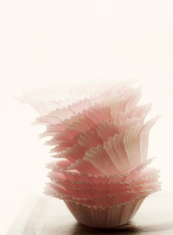 Stack of delicate pink paper muffin liners Photograph by Images by Ania H. photgraphy