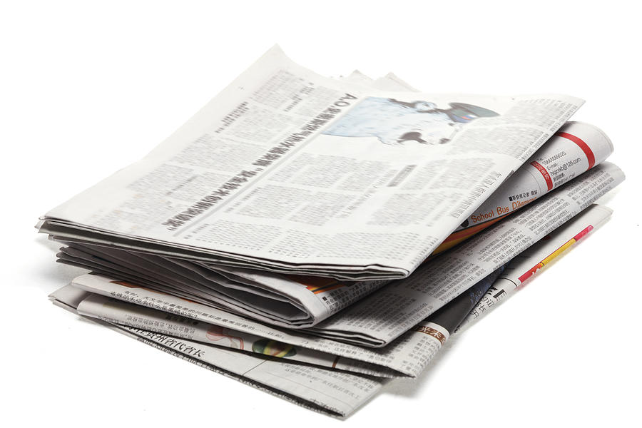 Stack of newspaper Photograph by View Stock