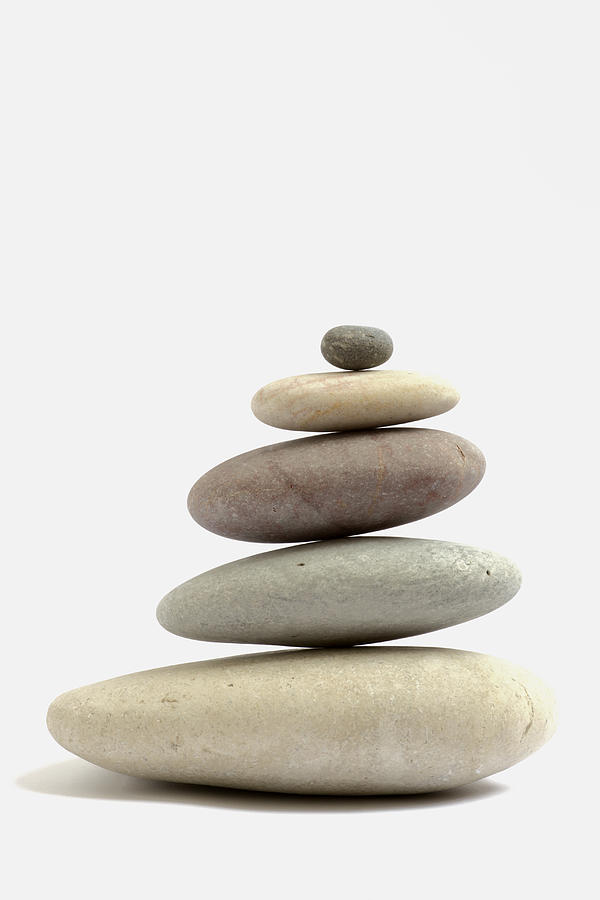 Stack of rounded pebbles, side view Photograph by Rosemary Calvert