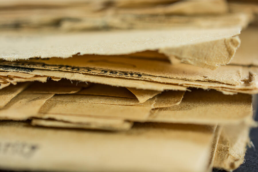 Stack of very old Yellowed Newspapers Photograph by Wwing