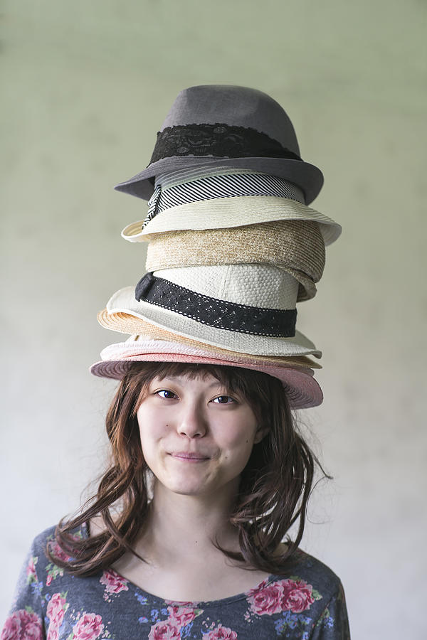 Stacked hat and girl Photograph by Ai