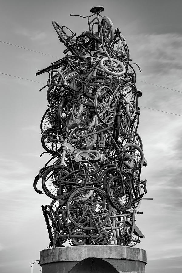 Black And White Photograph - Stacked Monochrome Bike Sculpture along Northwest Arkansas Razorback Greenway by Gregory Ballos