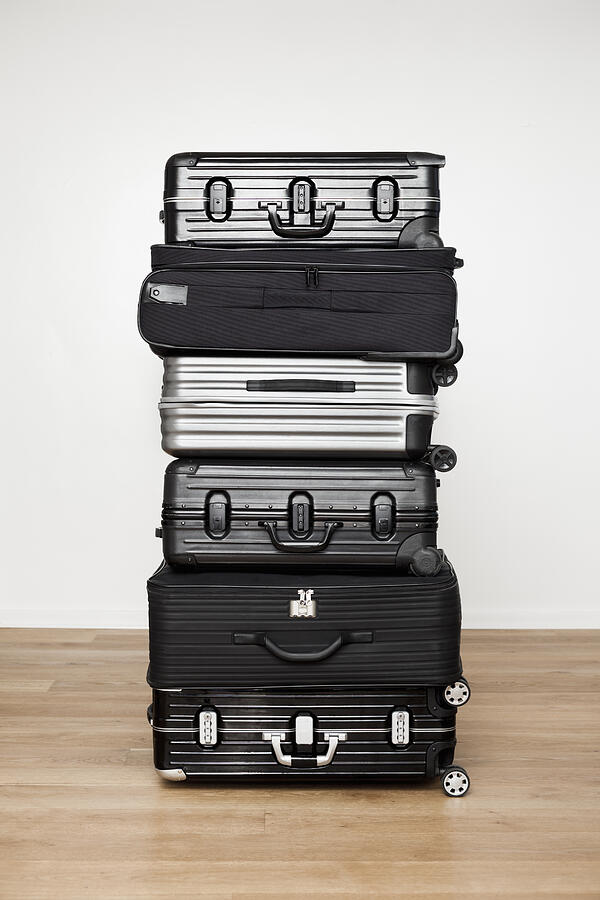 Stacked suitcases Photograph by Jorg Greuel
