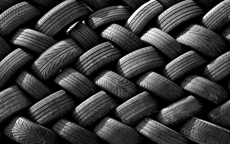Stacked Tyres Photograph by Stuart Allen