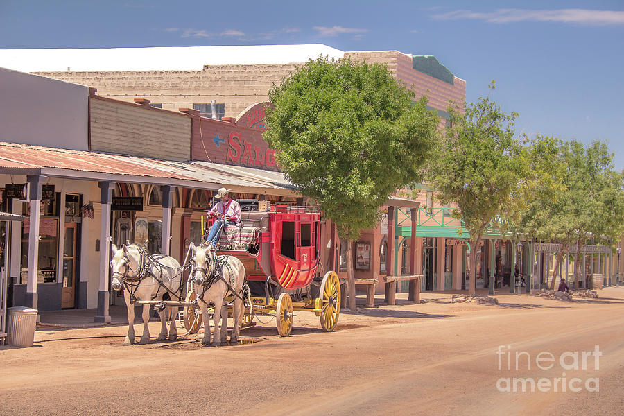 Stagecoach on Main st. Photograph by Darrell Foster
