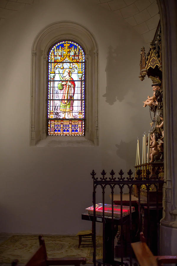 Stained-glass windows and statues inside St. Jerome the Royal Church, Madrid Photograph by Anna Pekunova