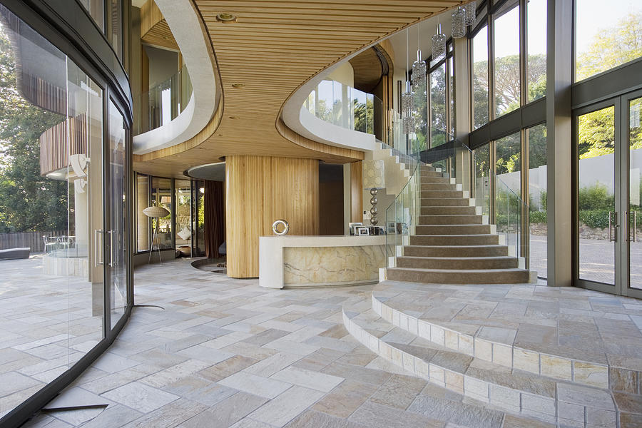 Staircase and entryway of modern home Photograph by Robert Daly