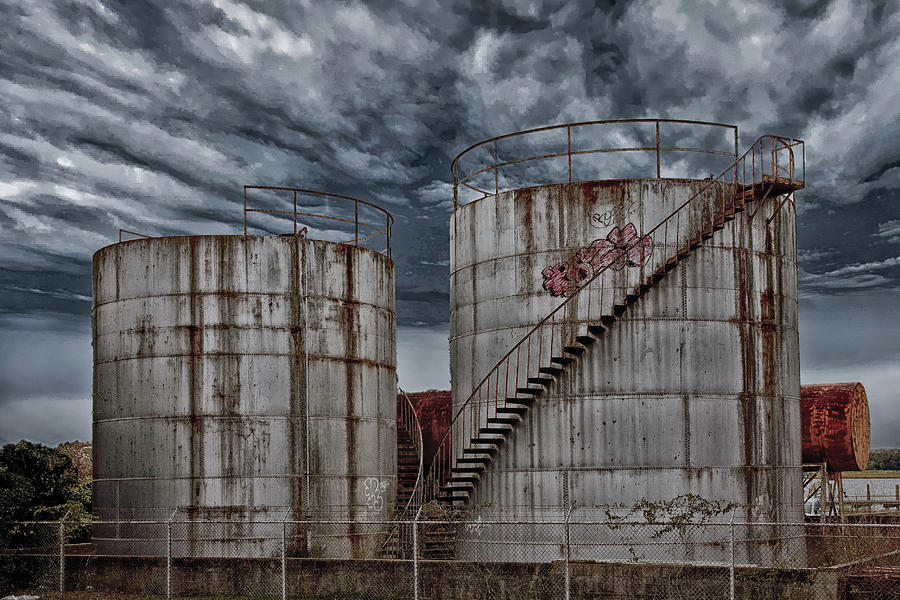 Stairs Around Old Round Tanks Photograph by Darryl Brooks