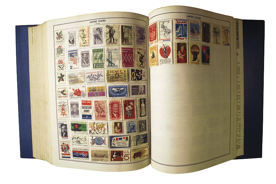 Stamp collection album Photograph by Comstock Images