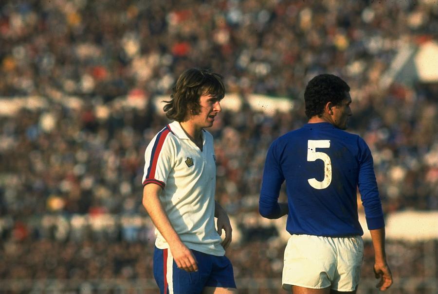 Stan Bowles of England and Claudio Gentile of Italy Photograph by Getty Images