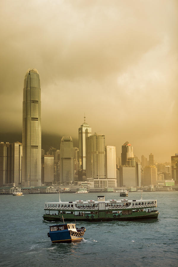 Star Ferry during sunrise Photograph by Merten Snijders